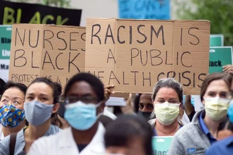 Group of healthcare workers protesting